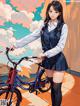 A girl in a school uniform standing next to a bike.