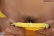 A close up of a woman's butt with a yellow panties.