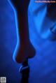 A close up of a bone on a blue background.